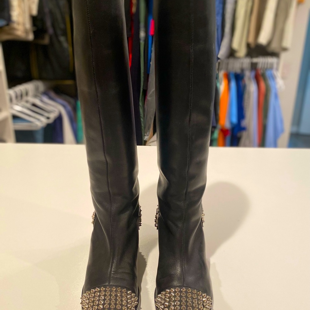 Christian Louboutin “Egoutina” studded boots.